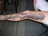 tree branch tats on leg